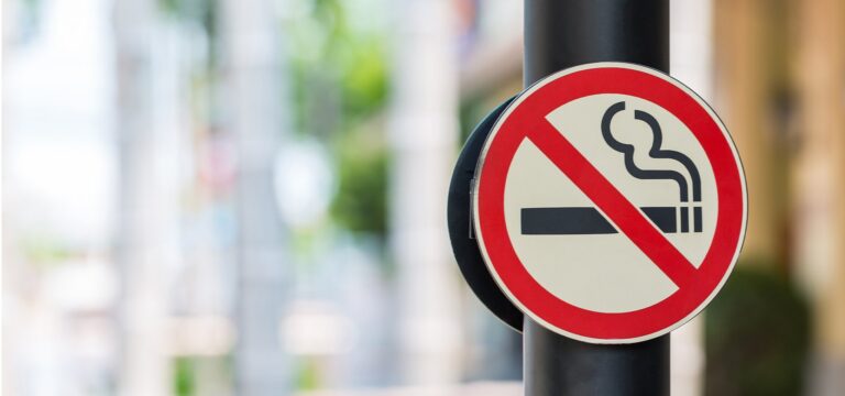 a no smoking sign reminds us how alcohol and nicotine disrupt sleep more than caffeine