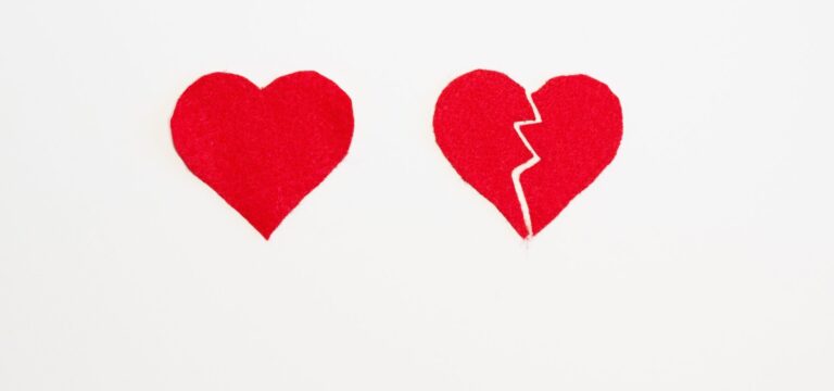 a healed heart next to a broken heart remind us about avoiding triggers after a breakup