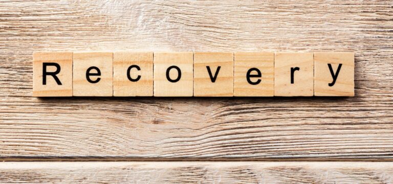 scabble letters spelling out recovery reminds us that people can and do recover