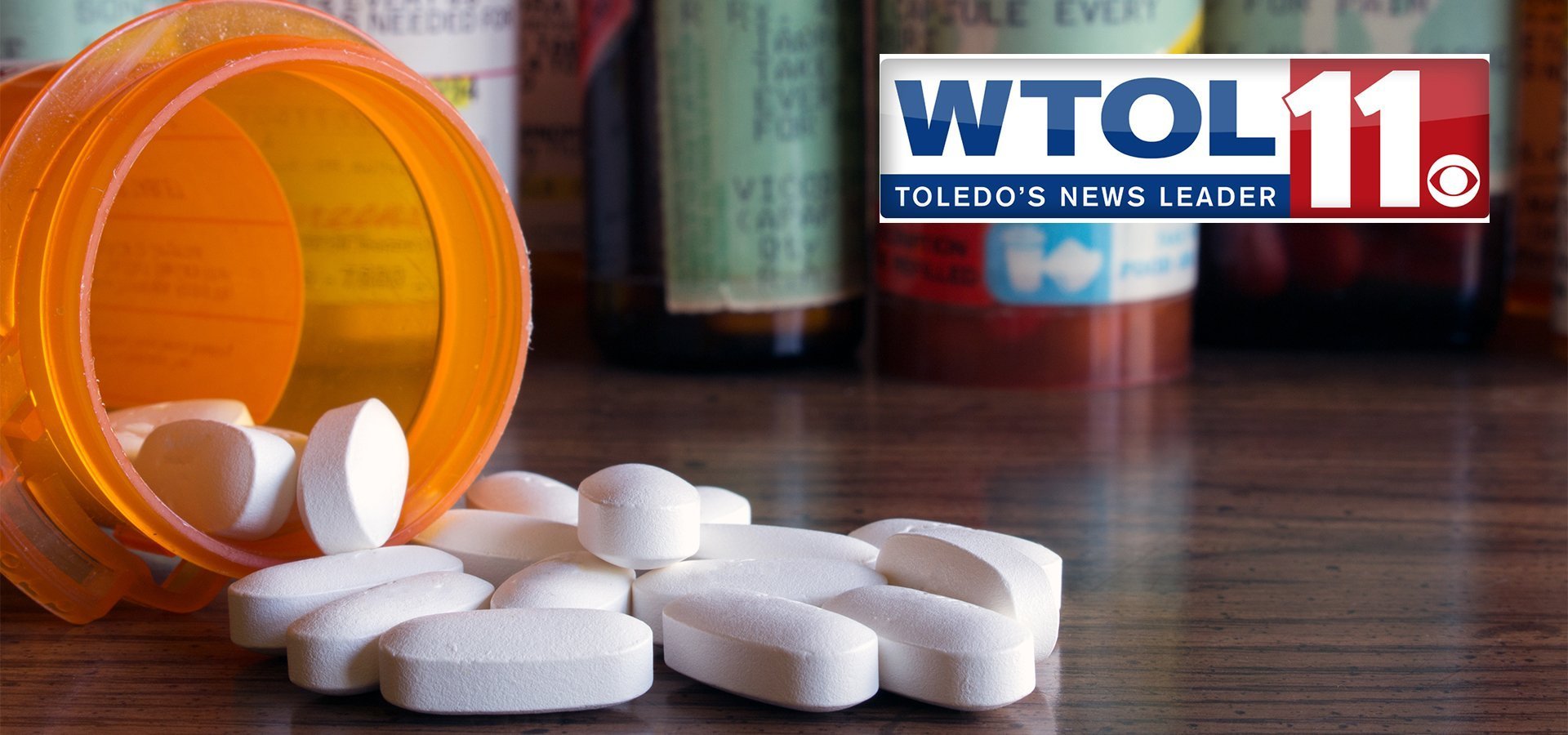 wtol logo next to a bottle of pills reminds us of wtol's dan cummins speaking to matt bell about the opioid crisis