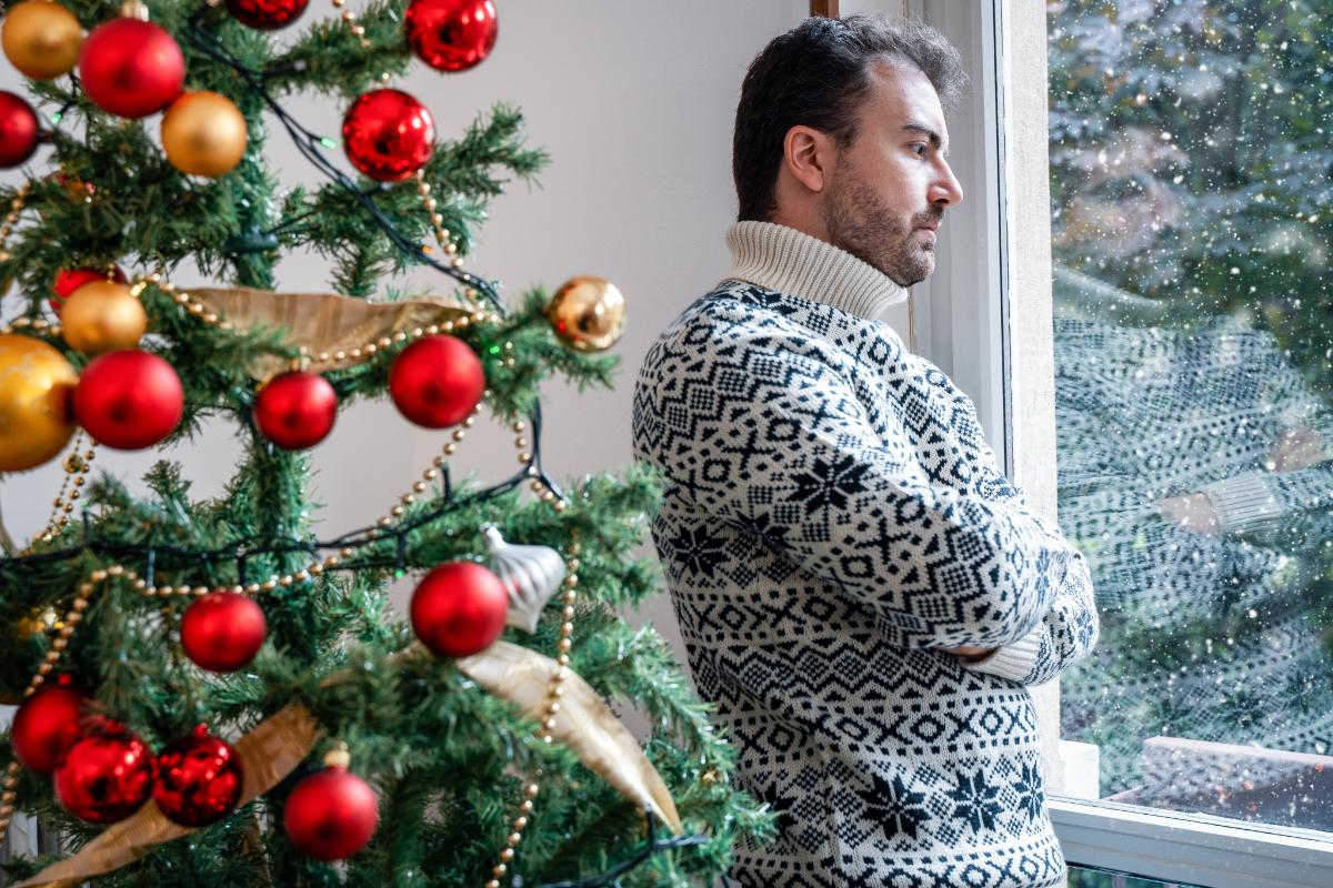 man struggling with social anxiety during the holidays
